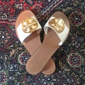 Tory Burch white sandals.